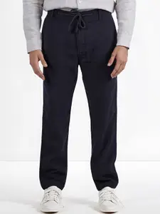 Celio Men Solid Self Design Regular Trousers