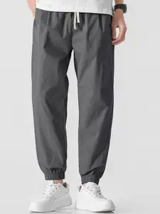 StyleCast x Revolte Men Solid Regular Trousers