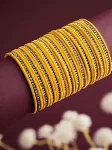 Anouk Sangria Set of 35 White AD Stone Studded & Yellow Velvet Textured Bangles