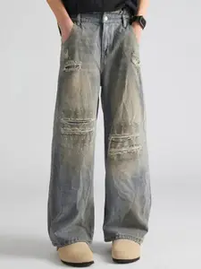 StyleCast x Revolte Women Regular Fit Mid-Rise Highly Distressed Heavy Fade Jeans