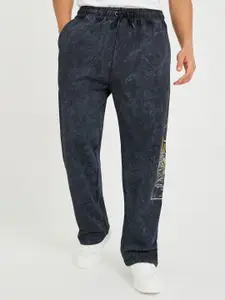 Styli Men Placement Printed Acid Wash Pure Cotton Oversized Track Pants