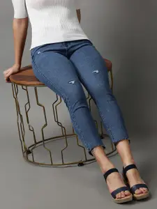 SHOWOFF Women Blue Slim Fit Mildly Distressed Light Fade Stretchable Jeans