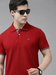 Arrow Men Solid Polo Collar Knitted Pure Cotton T-shirt With Minimal Embroidered Detail