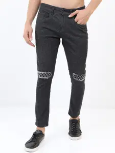 HIGHLANDER Men Black Cotton Skinny Fit Mildly Distressed Ripped Stretchable Jeans