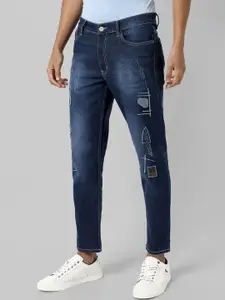 Campus Sutra Men Smart Slim Fit Mildly Distressed Light Fade Stretchable Cotton Jeans