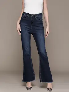 bebe Women Denim Daze Frayed Hem Bootcut Light Fade Stretchable Jeans