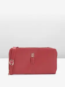 Baggit Women Solid Applique PU Zip Around Wallet With A Sling Strap
