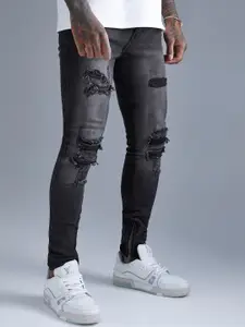 boohooMAN Super Skinny Fit All Over Rip & Repair Jeans