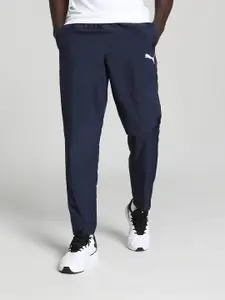 Puma Men Solid Mid Rise Woven Regular Fit Track Pants