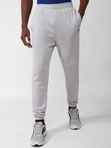 Reebok Men Solid French Terry Joggers