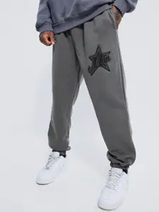 boohooMAN Solid Joggers with Applique Detail