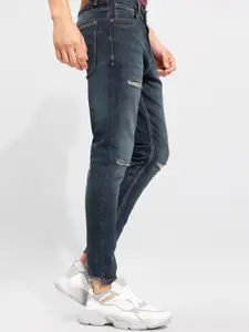 Snitch Men Blue Low-Rise Slash Knee Whiskers Light Fade Skinny Fit  Jeans