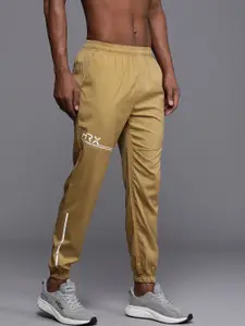 HRX by Hrithik Roshan Men Brand Logo Printed Mid-Rise Rapid-Dry Training Joggers
