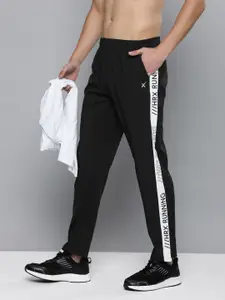 HRX by Hrithik Roshan Men Solid Rapid-Dry Running Track Pants With Side Stripes
