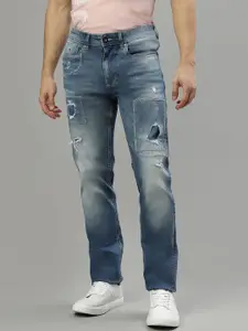 Iconic Men Slim Fit Mildly Distressed Heavy Fade Jeans