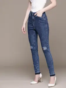 bebe Women Denim Daze Super Skinny Fit Low Distress Light Fade Stretchable Jeans