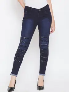 Nifty Women Slim Fit Highly Distressed Light Fade Ripped Stretchable Cotton Jeans