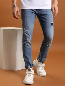HIGHLANDER Men Skinny Fit Mid-Rise Low Distress Light Fade Stretchable Jeans