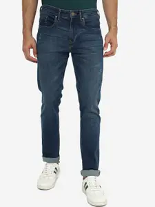 JADE BLUE Men Blue Slim Fit Clean Look Light Fade Whiskers & Chevrons Stretchable Jeans