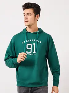 Styli Green Varsity Printed Hooded Relaxed Fit Pure Cotton Pullover Sweatshirt