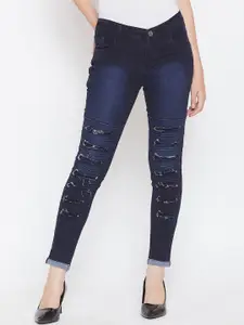 Nifty Women Skinny Fit Highly Distressed Light Fade Stretchable Jeans