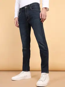 Wrangler Men Slim Fit Mid-Rise Light Fade Clean Look Stretchable Jeans