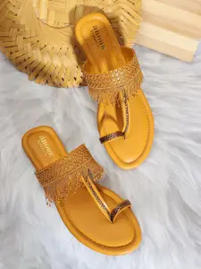 Anouk Mustard Yellow Textured Tasseled One Toe Flats