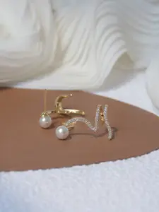 VAGHBHATT Gold-Plated Twisted Shining Studs Earrings