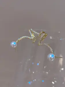 VAGHBHATT  Gold Plated Stones Studded & Beaded Twisted Snake Shape Studs Earrings