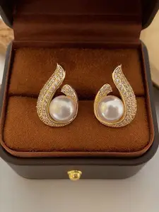 VAGHBHATT Gold-Plated Teardrop Shaped Studs Earrings