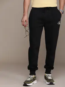 Calvin Klein Jeans Men Solid Mid-Rise Regular Fit Joggers
