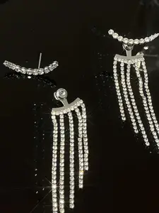 VAGHBHATT Silver Plated Cubic Zirconia Studded Tassel Design Drop Earrings