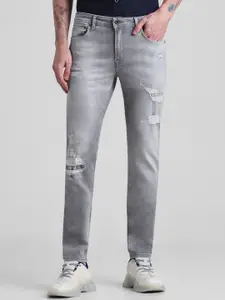 Jack & Jones Men Ben Skinny Fit Low-Rise Mildly Distressed Light Fade Stretchable Jeans