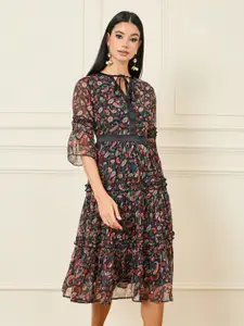 Styli Floral Print Tie-Up Neck Bell Sleeve A-Line Dress