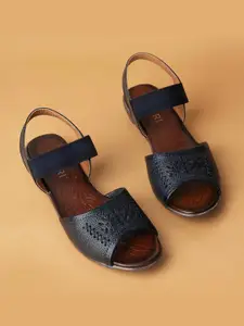 Ozuri Textured Laser Cuts Leather Wedge Heels