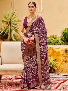 Saree mall Ethnic Motifs Printed Ikat Sarees with Tassels