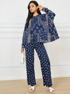 Styli Printed Relaxed Fit Round Neck Top & Flared Trouser Co-Ords