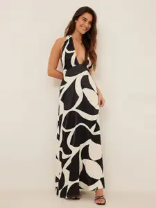 Mitera Abstract Printed Halter Neck Fit And Flare Maxi Dress