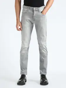 Flying Machine Men Mid Rise Tapered Fit Heavy Fade Stretchable Jeans