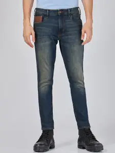 Wrangler Men Bostin Slim Tapered Fit Mid Rise Clean Look Light Fade Stretchable Jeans