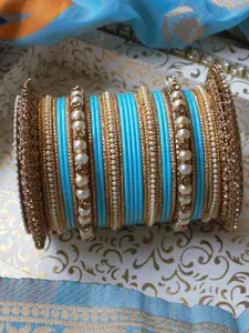 leshya Set of 66 Brass Plated Artificial Stone Studded Bangles