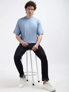 Calvin Klein Jeans Men Round Neck Solid Relaxed Fit Applique T-shirt