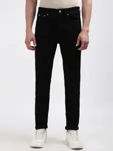 Calvin Klein Men Tapered Fit Mid-Rise Clean Look Jeans
