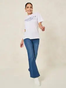 Styli Women Brooklyn Slogan Roll Up Oversized T-Shirt