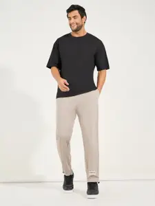 Styli Men Ultra Soft Slim Pintuck Athleisure Joggers with Badge Detail