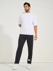 Styli Men Ultra Soft Slim Pintuck Athleisure Joggers with Badge Detail