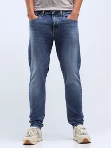 Flying Machine Men Tapered Fit Low Distress Light Fade Stretchable Jeans