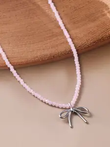 Rubans Rhodium Plated Soft Pink Beaded Necklace with Silver Bow Pendant