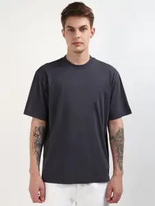 Calvin Klein Jeans Men Solid Round Neck Cotton Relaxed Fit T-Shirt