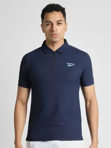 Reebok Men Solid Polo Collar Slim Fit T-Shirt